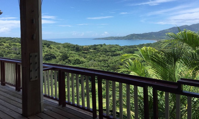 Tejas House | Enjoy ocean views and breezes as you relax in one of the hammocks on the deck