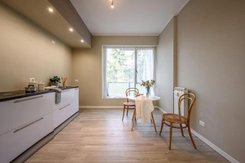 Crocifissa di Rosa Apartment | Essenza Moderna