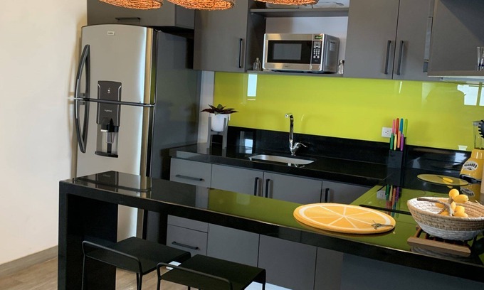 Laureles - Estadio Apartment | Evergreen 203 tropical jungle studio.