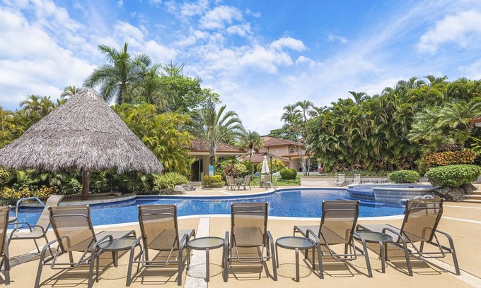 Herradura Condo | Experience a contemporary luxury condo with pool, gym, and beach club access.