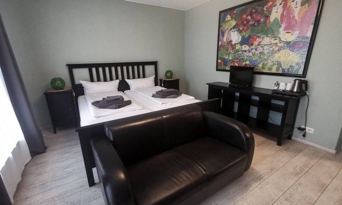 Neumuenster House | Family room with two separate bedrooms