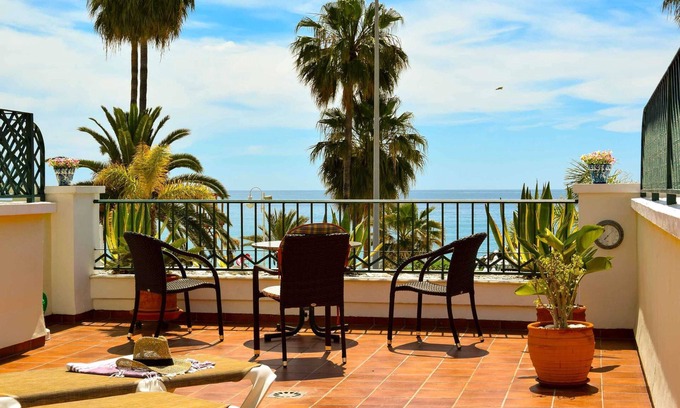 Nerja Apartment | First line of beach, comfortable apartment overlooking Playa Burriana bay