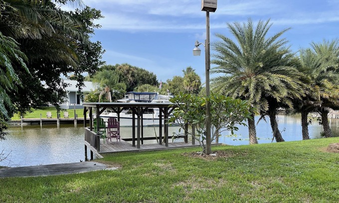 Taylor Creek House | Fisherman's paradise! Private corner canal lot with boat ramp and dock