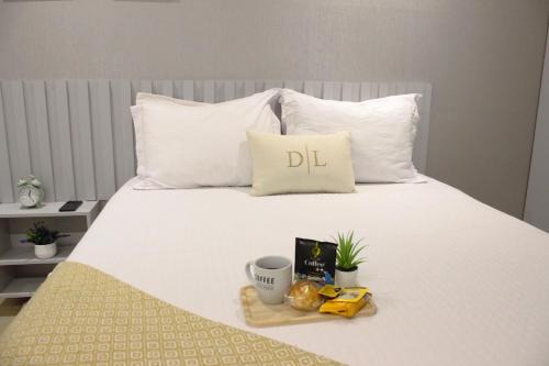 Lago Norte Apartment | Flat aconchegante - Perto de Tudo - Vista Livre - Estacionamento privativo e Portaria 24h - Wi-Fi 600mbps