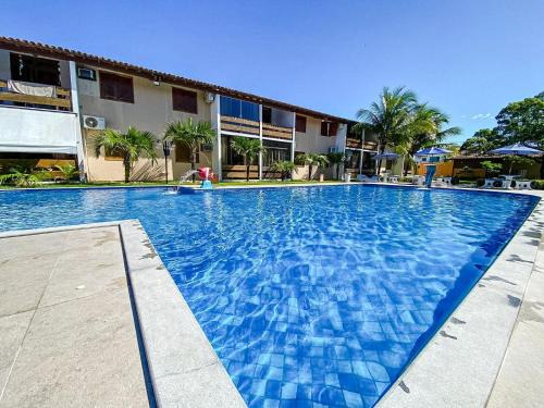Taperapua Beach House | Flat com 1 quarto com ar split, sala e cozinha completa, No condomínio Portal do Atlântico a 100m praia de Taperapuã (Barraca do Gaúcho) , portaria 24hrs, piscina.