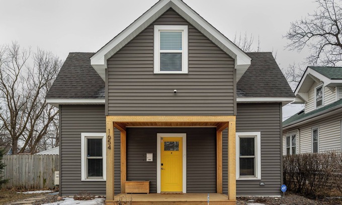 Midway House | Follow the Yellow Front Door to a welcoming home close to everything.