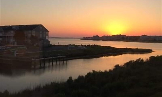 Ocean View Condo | FREE DAILY ACTIVITIES INCLUDED! Only a few miles from Bethany Beach this beautifully decorated second floor unit offers 2 bedrooms with 2 full baths and is nestled within unspoiled land and gently lapping inland waterways