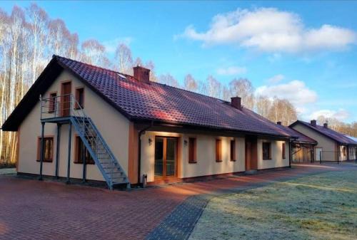 Trzciniec Hotel | Gościniec nad Dobrzycą