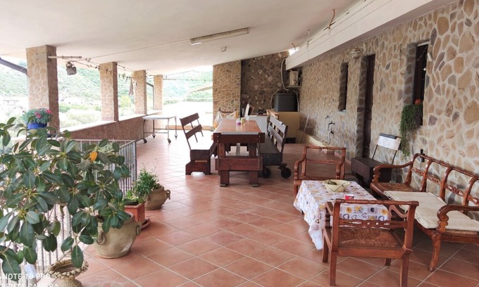 Gonnesa Apartment | Granny flat - one-room apartment souterrain with sun terrace on the outskirts