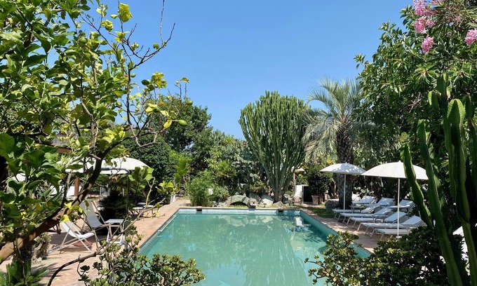 Panza Apartment | "Greta's cottage," with garden, swimming pool and spa hot tub