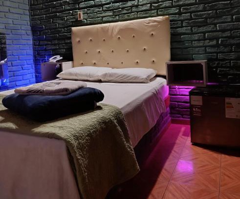 Salto House | Habitaciones amplias con baño y garage privado Motel Coloso