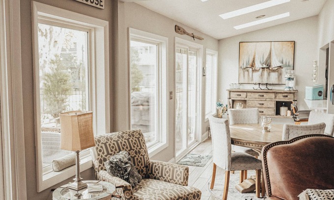 Portage Lakes Cottage | HEAVENLY Portage Lakes water front 4-bedroom cottage with HOTTUB, dog friendly!