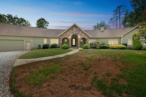 Sandston House | Hidden Waterfront Luxury Oasis with 9-Acre Pond home