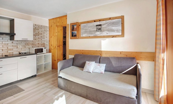 San Rocco Apartment | Holiday Apartment 'Baita Doss' with Mountain View, Balconies & Wi-Fi