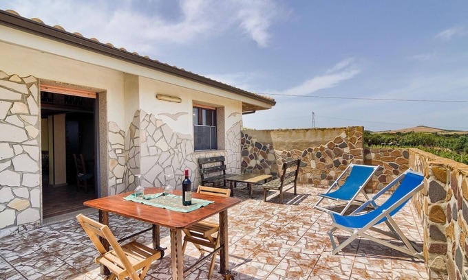 Gonnesa Apartment | Holiday feeling in a quiet area apartment on olive grove with Wi-Fi!