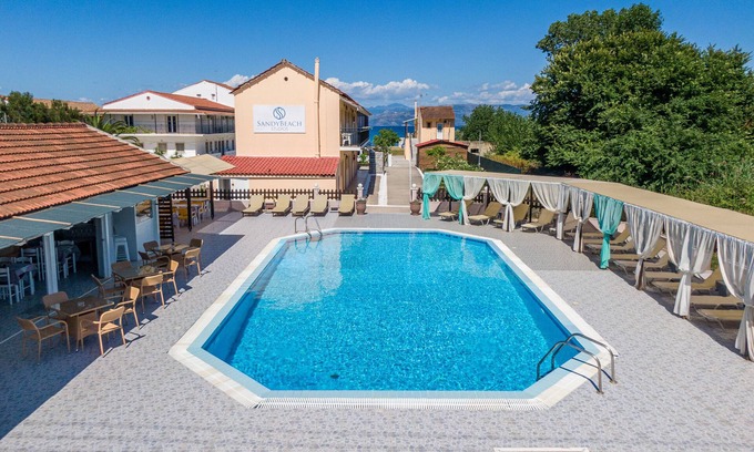 Kavos House | Holiday Home 'Sandy Beach House - Ground Floor' with Shared Terrace, Wi-Fi and Air Conditioning