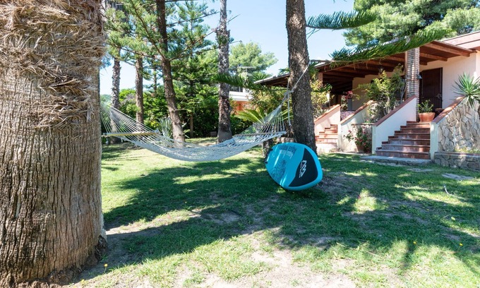 Cala Sinzias Villa | Holiday Home with Air Conditioning, Garden & Terrace; Parking Available, Pets Allowed