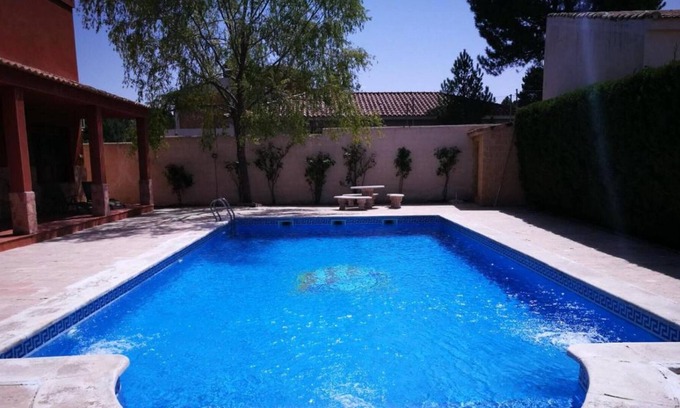 Arcas del Villar Villa | Homerez - Big villa for 14 ppl. with swimming-pool and jacuzzi at Arcas