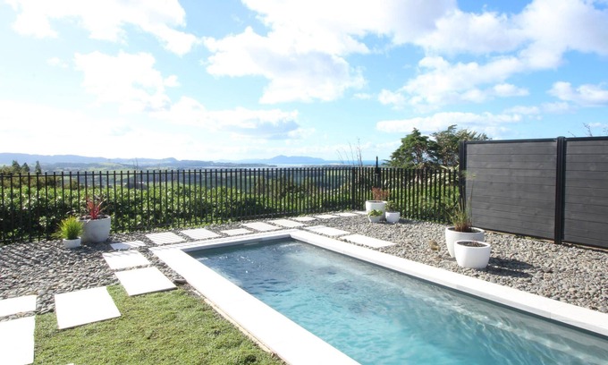 Mangawhai House | In the Clouds - Luxury accommodation with stunning views, spa and pool