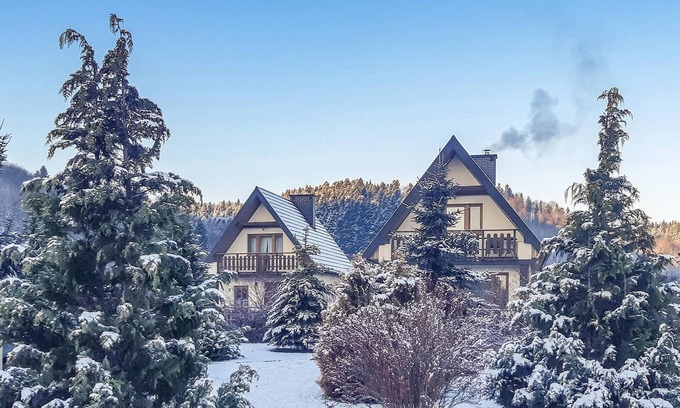 Lesko House | In the idyllic south of Poland, this cozy vacation home welcomes you in Lesko.