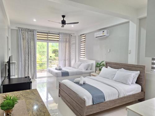 Panglao House | INATO SUITES Rm 2 2 queen beds