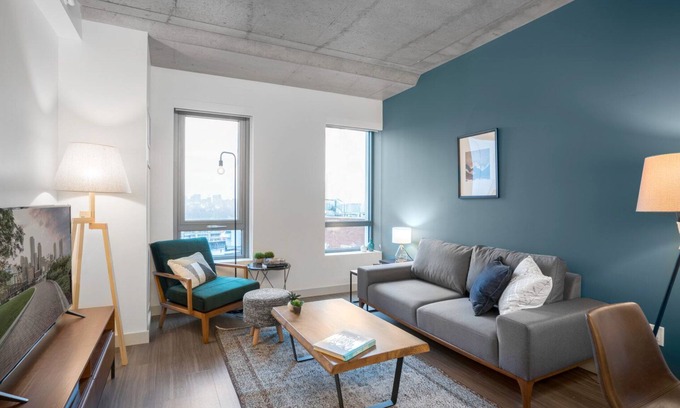 MIT Apartment | Industrial 1BR near MIT w/Gym, Doorman, Roof Deck