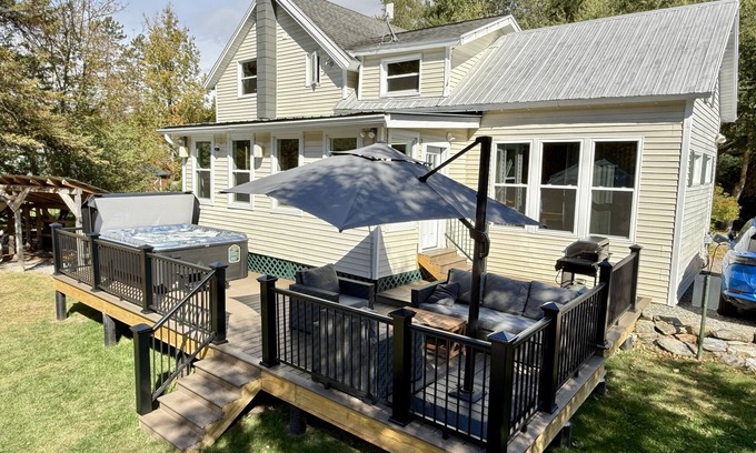 Montgomery Center House | Inviting riverfront home with hot tub on deck & fireplace, near skiing & golf