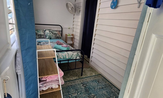 Mount Morgan Bed & Breakfast | King Single plus 3 Singles in Meyenburg House with shared bathroom & kitchen