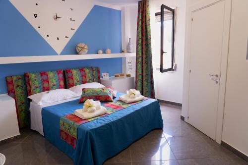 Scalea Bed & Breakfast | L'Orologio Guest Rooms
