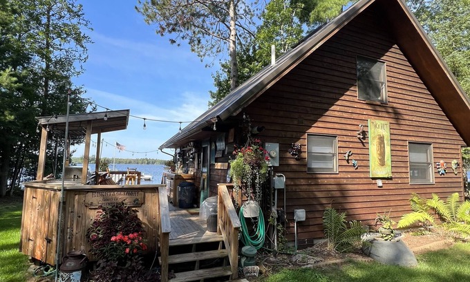 Stone Lake Cabin | Lake Front Cabin steps off Big Sissabagama Lake with NEW Fitness Center & Sauna!