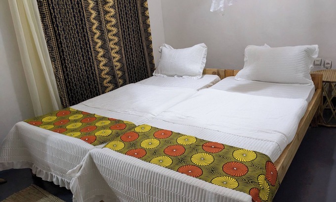 Ruhondo Apartment | LAKE RUHONDO FAMILY ROOM near lake Ruhondo in twin lake region with volcanoView