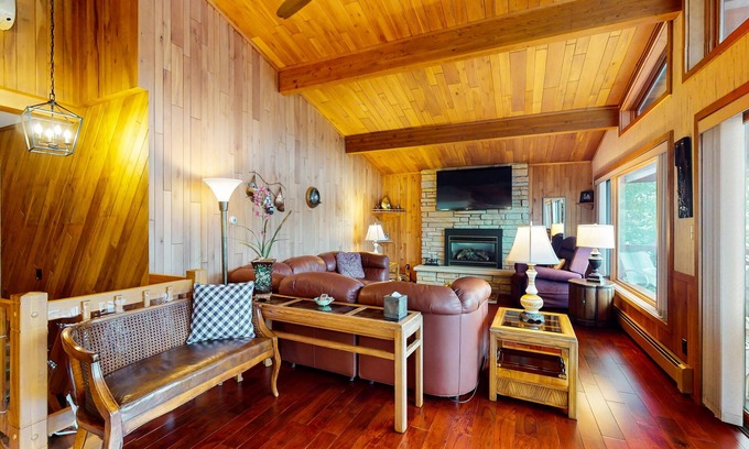 Lake Tomahawk House | Lakefront home on South Two Lakes with lake views, lake access, firepit, & dock