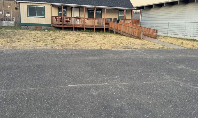 Lakeside House | Lakeside Retreat with Big Porch, Extra Parking, and Prime Downtown Location