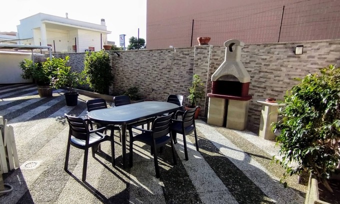 Lizzano Apartment | Large two-room apartment with garden and outdoor barbecue 7km from the sea