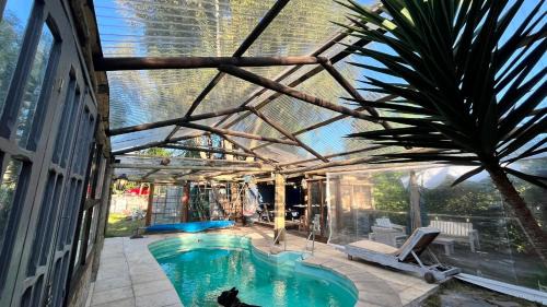 Neptunia House | Lo de Acosta , Piscina Climatizada