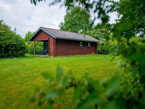 Damp House | Log cabin in the Baltic Sea resort of Dampland