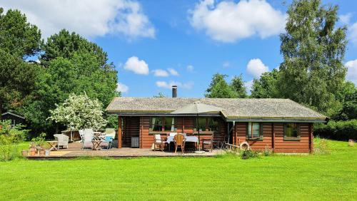 Holbaek House | Log House In Holbæk With Vintage Charm