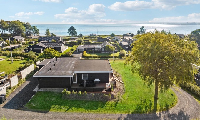 Hvidbjerg Strand House | Look forward to a magnificent sea view on vacation in this attractive vacation home.