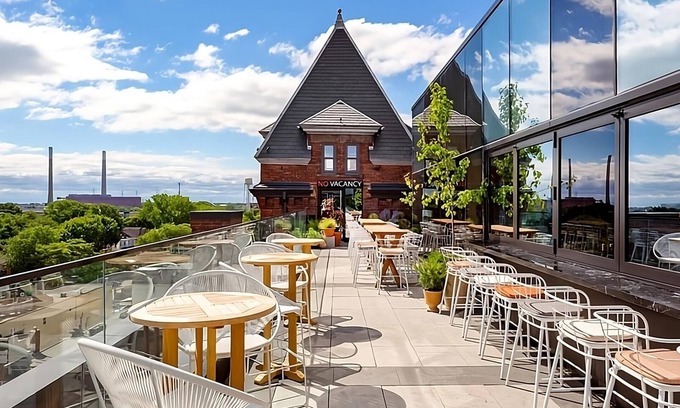 Riverside Hotel | Look No Further! Rooftop Bar with Views, Coffeehouse, Pet-Friendly