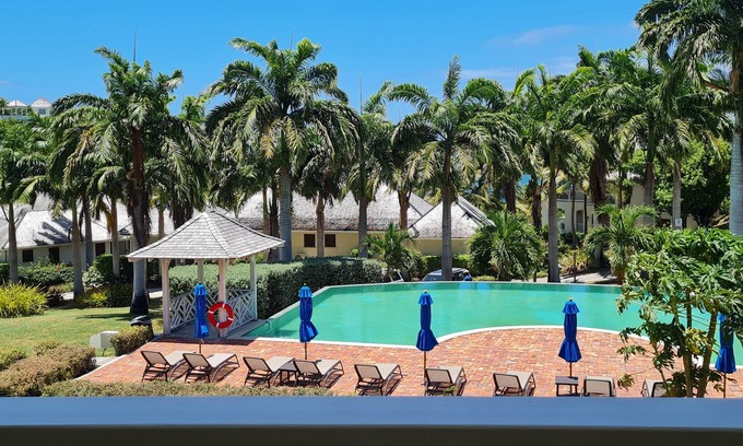 Freetown Apartment | Lovely Pool-side 1-Bedroom Suite with Beach Access