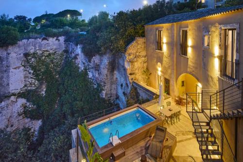 Grottasanta House | LTM greenhouse