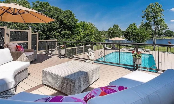 Norton Shores House | Luxury Lakefront 6-Bed Home in Norton Shores with Pool, Hot Tub, Video Games