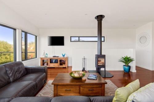 Surf Beach House | Luxury Retreat at Pristine Surf Beach with wood fireplace