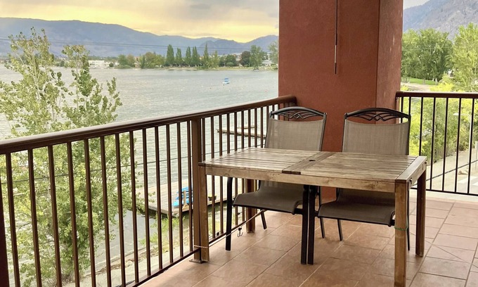 Okanagan-Similkameen Condo | Luxury top-floor Penthouse with private dock, pool and stunning lake views.