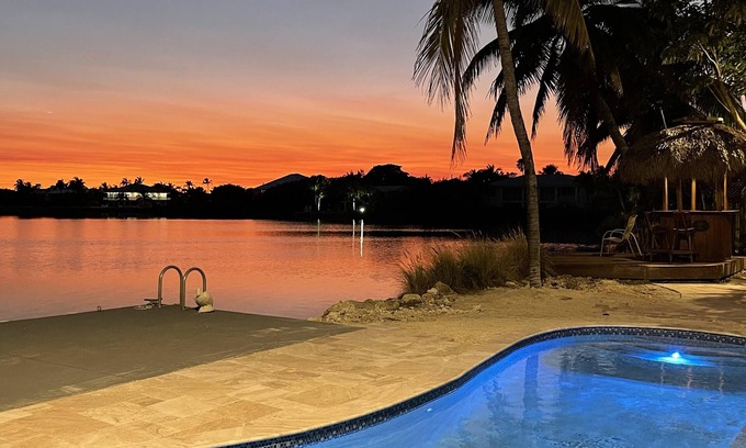 Sugarloaf Shores House | Luxury Waterfront Home with Gorgeous Pool, Tiki Bar and Sunsets