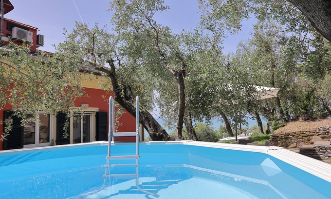 Lavagna Villa | Maiso house nestled between the sea and olive trees