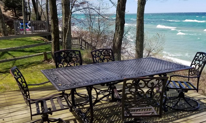 Manistee House | Make Memories this summer, suite, firepit, deck on Lake Michigan