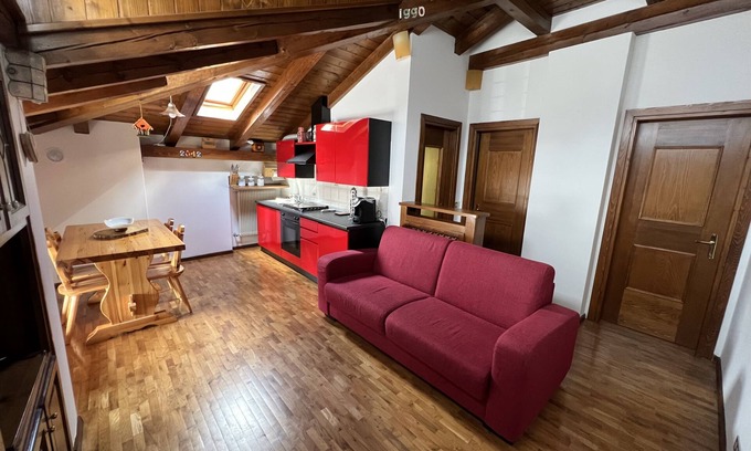 Auronzo di Cadore Apartment | Mansard facing ski slopes and funbob