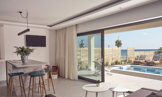 Alykes Apartment | Maritimus Excelsior suites 1 right onto sandy Alykes Beach