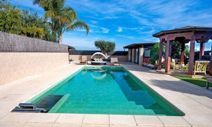 Comarruga House | Masia Blanca by Interhome